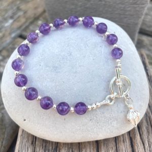 Amethyst and seed charm bracelet