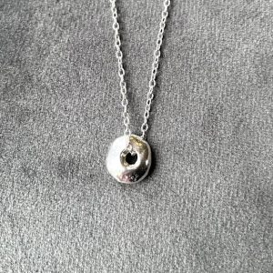 Silver Hag Stone pendant